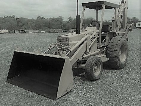 black and white of a backhoe